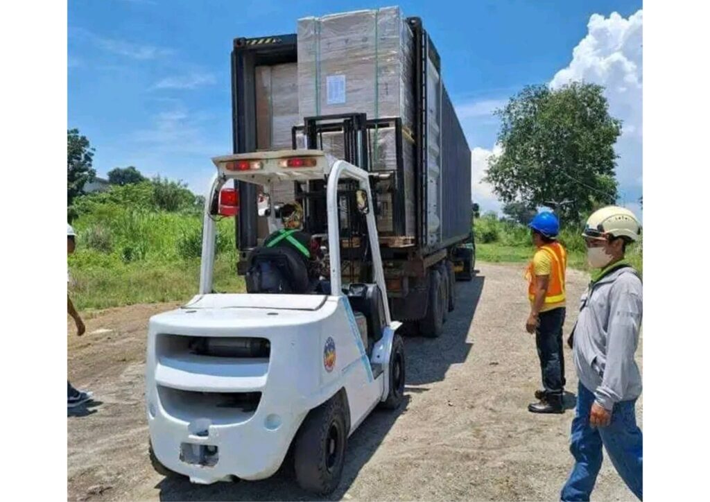 Forklift unloading cargo from container in Lagos warehouse Nigeria