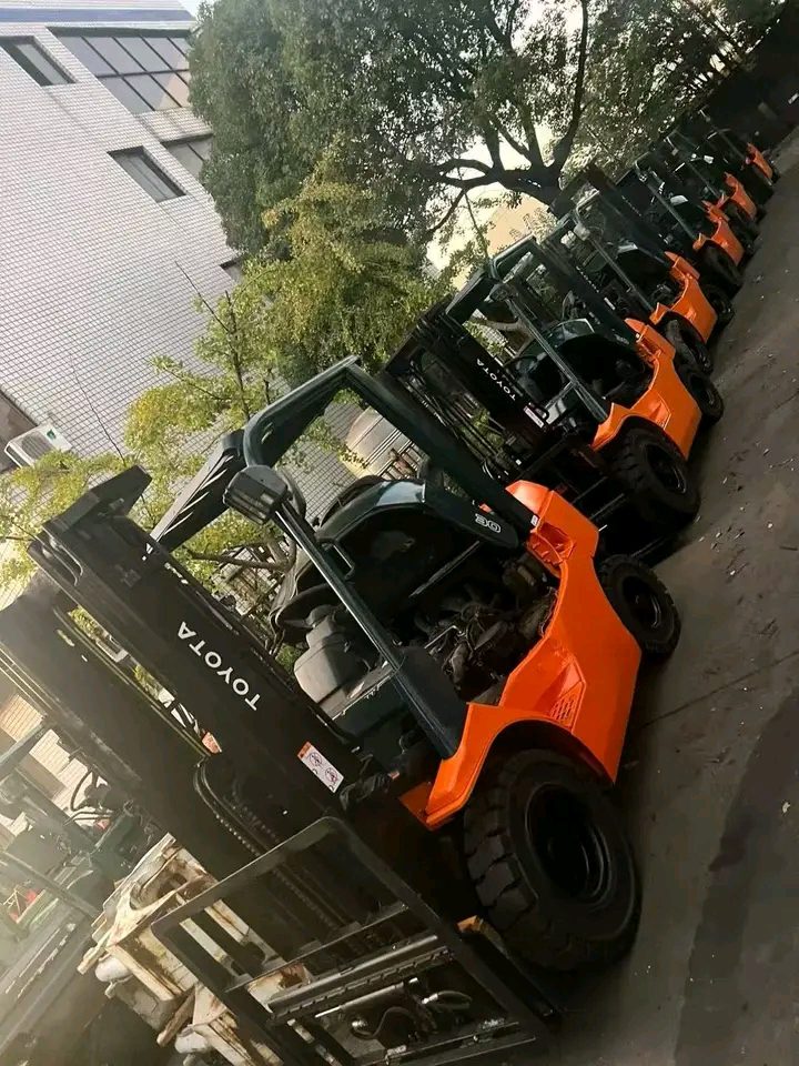 Toyota forklifts lined up for industrial warehouse operations