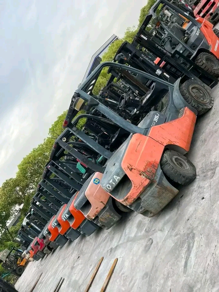 Toyota forklifts lined up for industrial warehouse operations